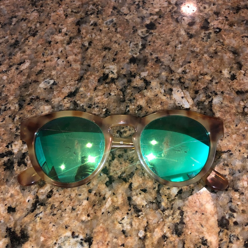 Westward leaning voyager green sunglasses